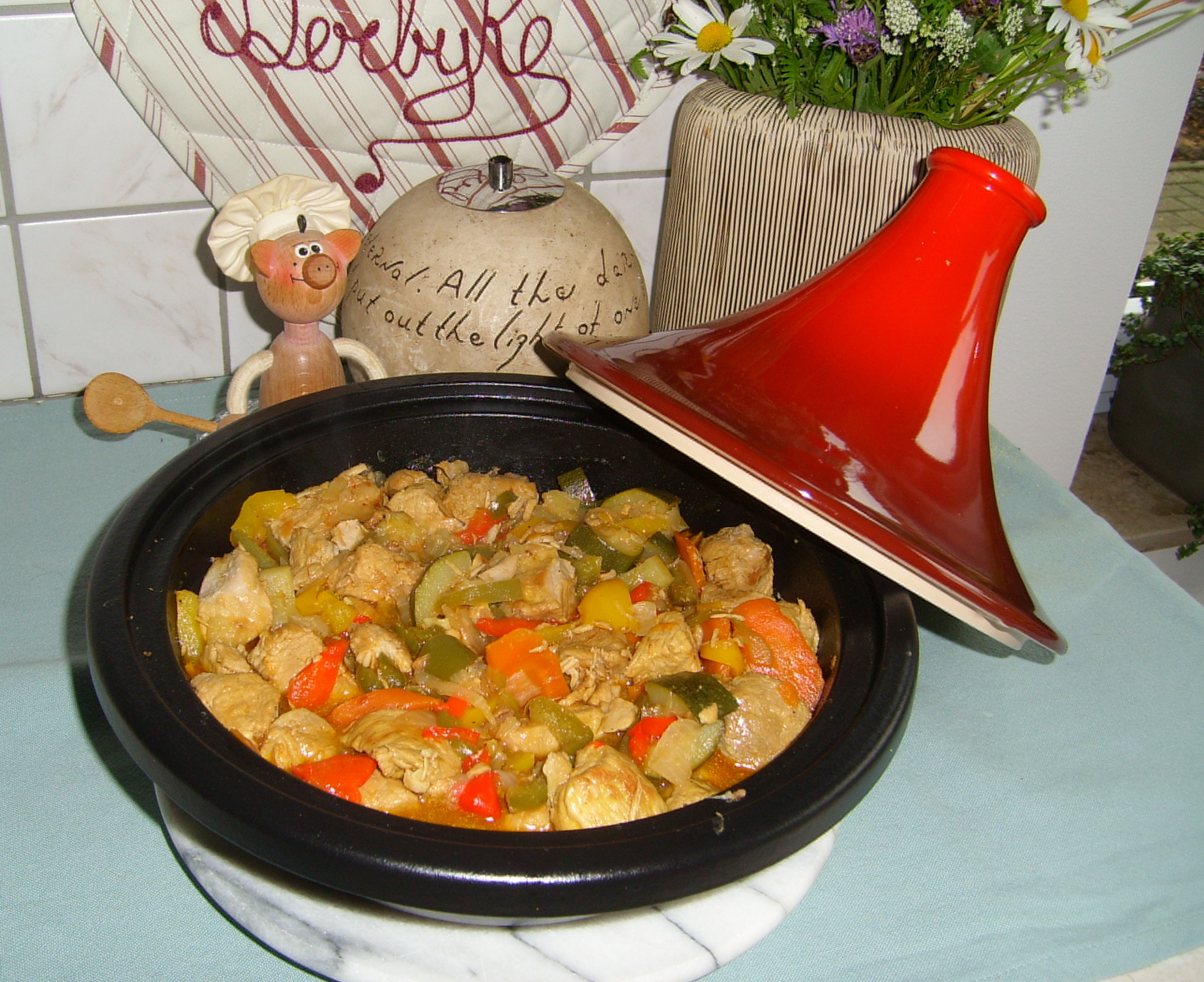 Tajine: varkensvlees met paprika goed gekruid