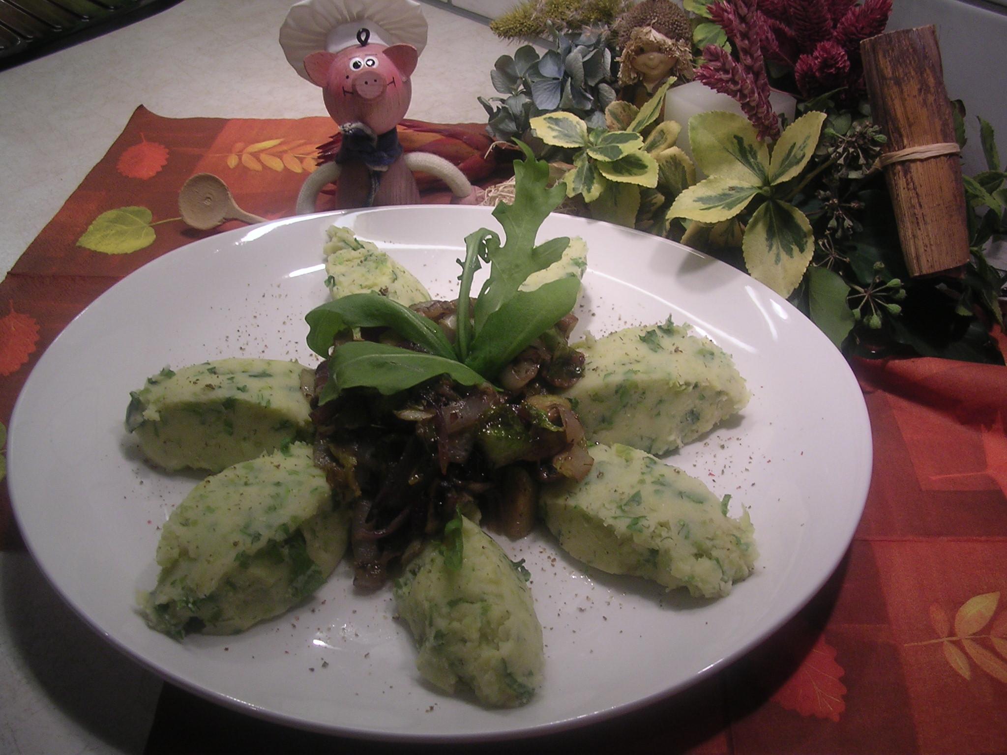 Aardappelpuree met spruiten en rucola