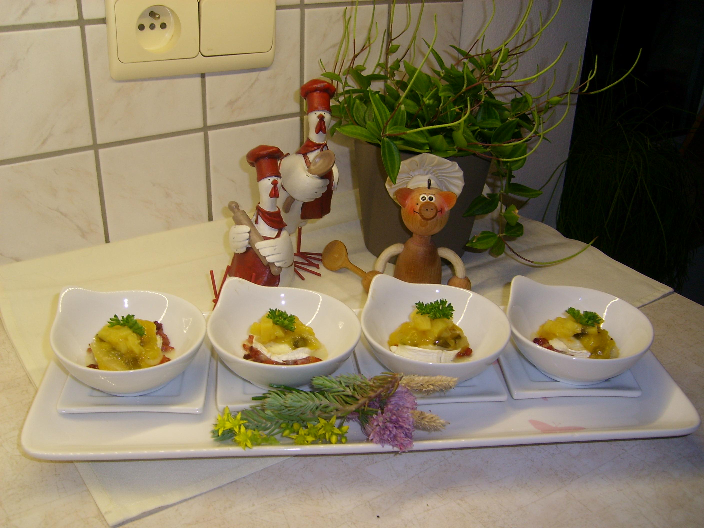 Hapje: geitenkaasje met gerookte spekblokjes