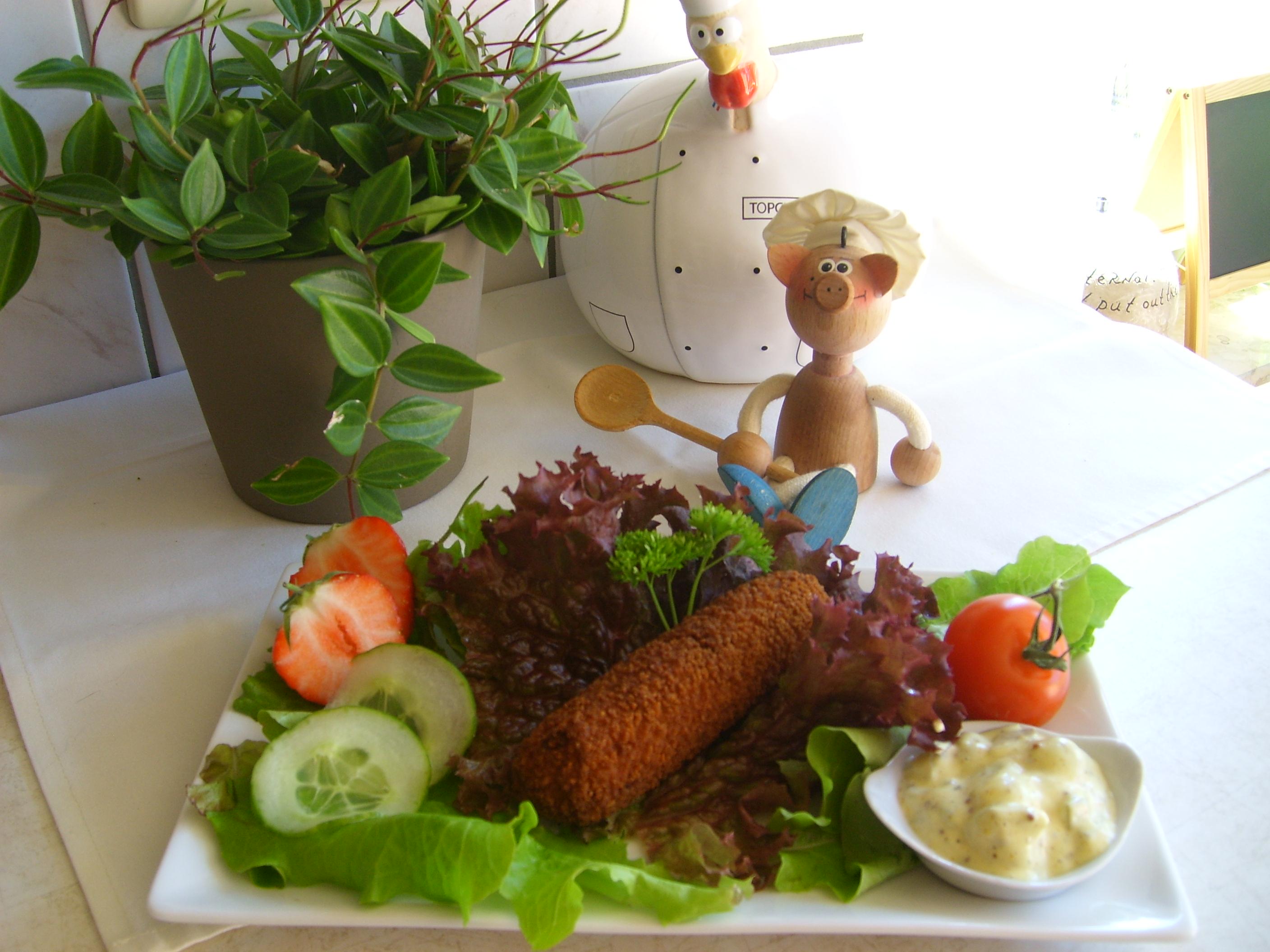 Iemand  zin in een kipfrikandel