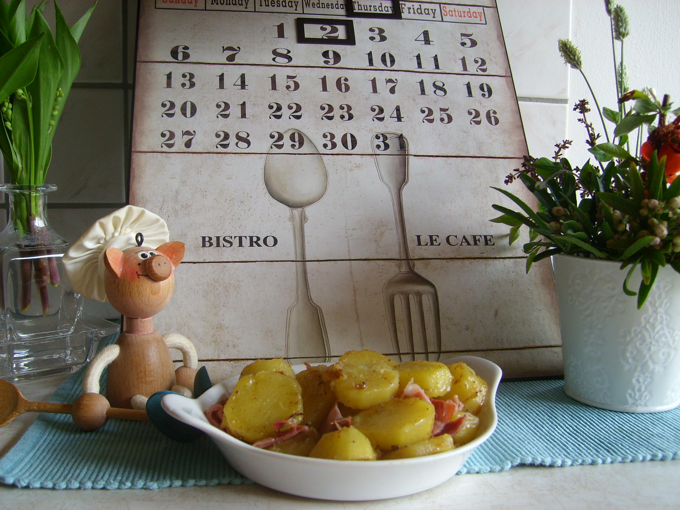 Aardappelen opgebakken met een Duits fijn gesneden hammetje