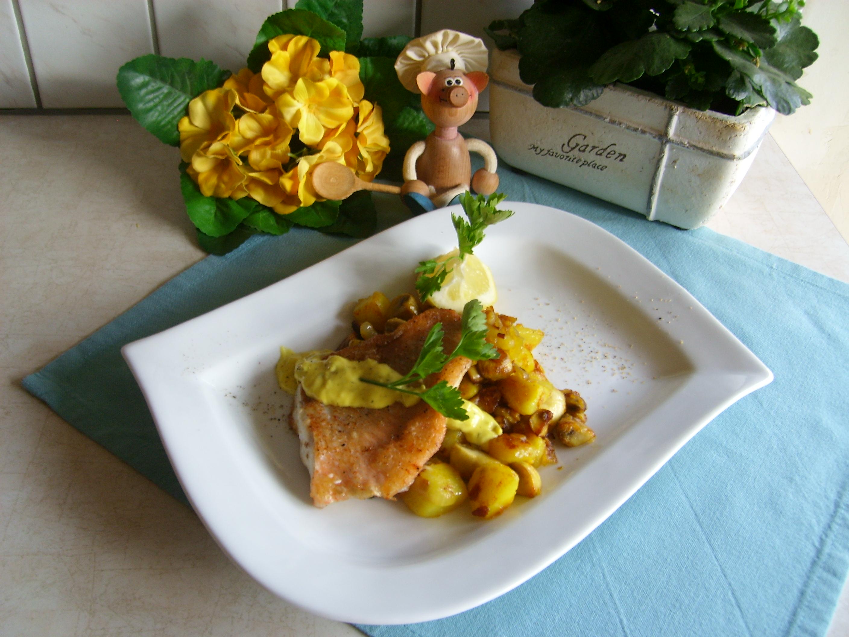 Roodbaarsfilet met zijn garnituren met saffraan