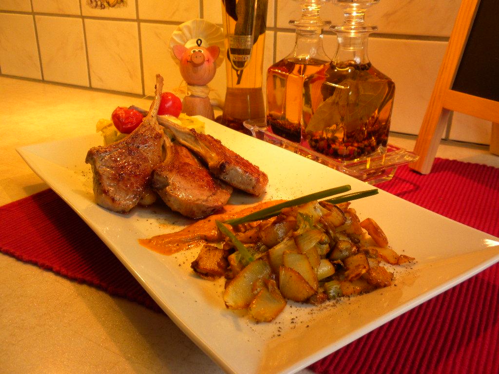 Lamskoteletjes gepresenteerd met witloof