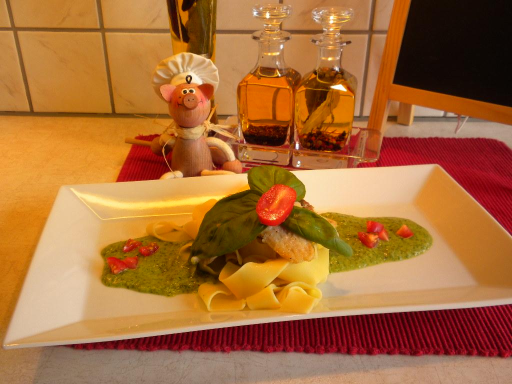 Zuiderse wijtingfilet op een bedje van pasta met basilicum roomsaus