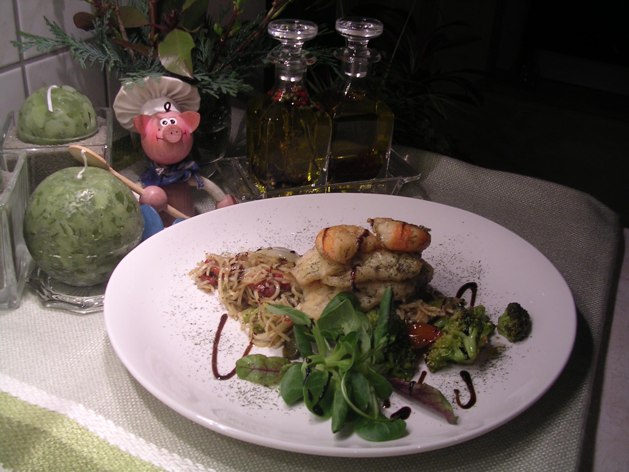 Pangasiusfilet met scampi en zijn garnituren