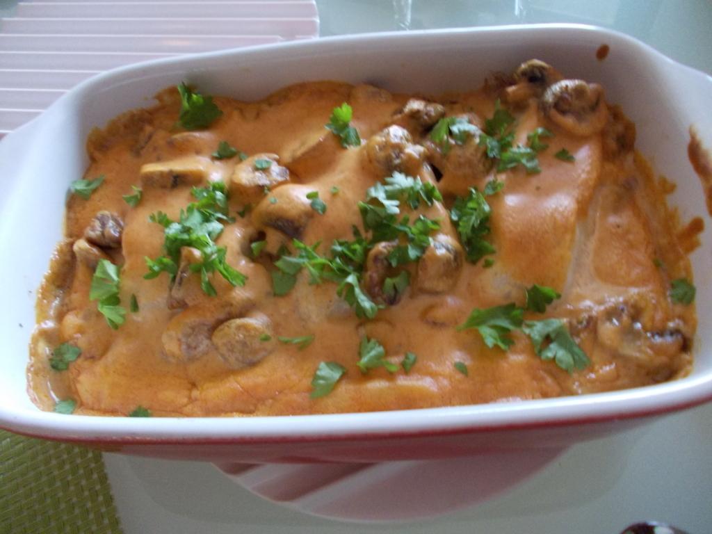 Hongaarse visfilet in paprikaroomsaus en champignons