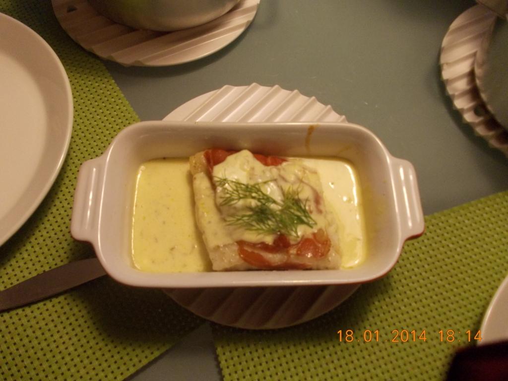 Zeewolffilet met serranoham en wittewijnmosterdsaus uit de oven