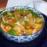Pompoen noedel soep met curry en zeevruchten