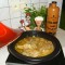 Tajine: kip bedolven onder de ajuin met heerlijke kruiden