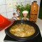 Tajine: kip bedolven onder de ajuin met heerlijke kruiden