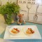 Hapje: tortellini op een bedje van zalm met een romig sausje