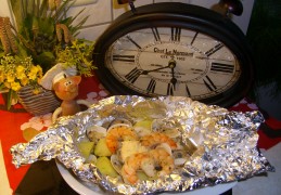 Papillotte:  clams en scampi's met currykaas