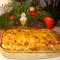 Macaroni met hespenrolletjes in kaasaus onder de grill