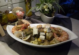 Clams met gorgonzola op een bedje van pasta