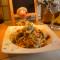 Spaghetti met kalfsmedaillon met zure room en fijne groenten