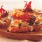 Hibiscus, brie en amandel crostini