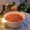 Spaghetti saus met rode pesto en rucola