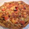 Pizza met tonijn en scampi's