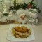 Dagschotel: kalkoenschnitzel op een bedje van kaas-spirelli  met opgebakken porei en gerookte spekblokjes