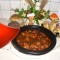 Tajine: karbonade met wortel, appel en krenten