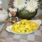 Aardappelpuree met witloof en rucola