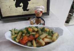 Groenten: schorseneren opgebakken met tomaat en rucola