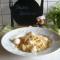 Dagschotel: spaghetti met een kaassausje vergezeld van St-Jacobsvruchten