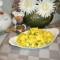 Aardappelpuree met witloof en rucola