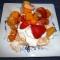 Pavlova met slagroom en vers fruit (glutenvrij)