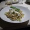 Romige risotto met courgette, basilicumpesto en burrata