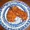 Krokante kipfilet met een laagje van cornflakes