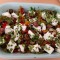Lauwwarme paprikasalade (peperonata) met feta
