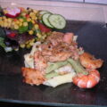 Lauwe pasta met zalm , gerookte zalm en scampi’s