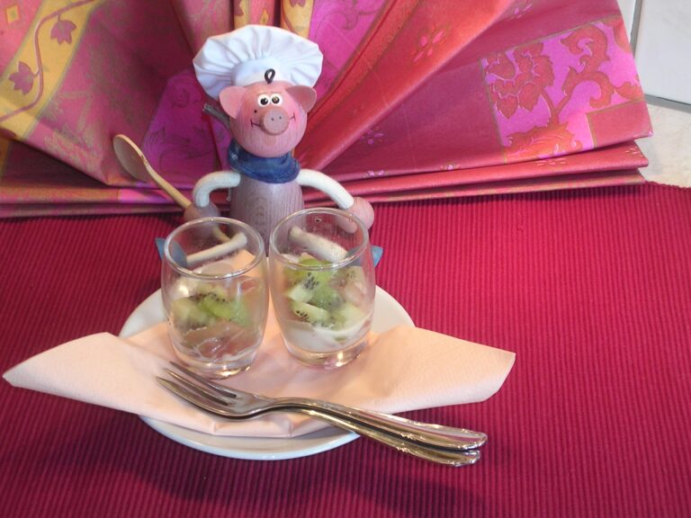 Hapje parmaham met kiwi en framboze dressing