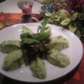 Aardappelpuree met spruiten en rucola