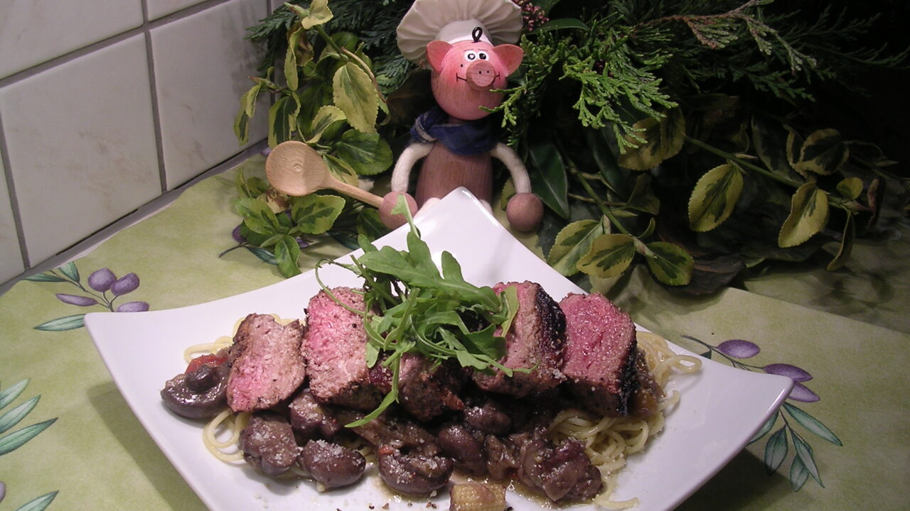 Gegrilde springbok steak met zijn garnituren