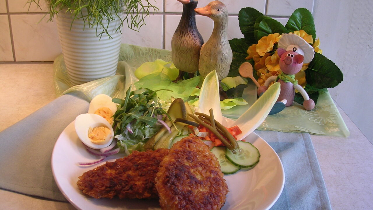 Gepaneerde kippefilets met amandelschilfers