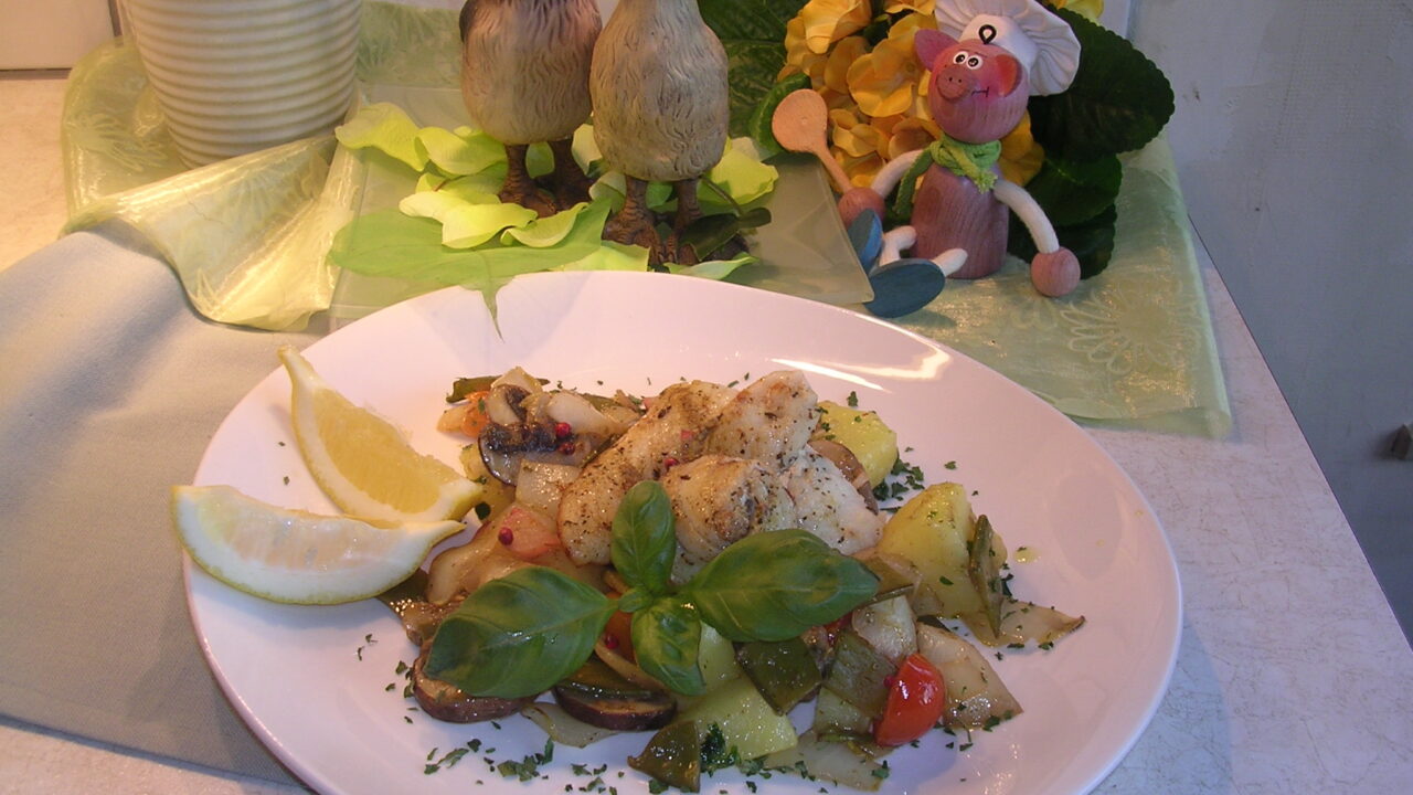 Pangasiusfilet geserveerd met verse groenten