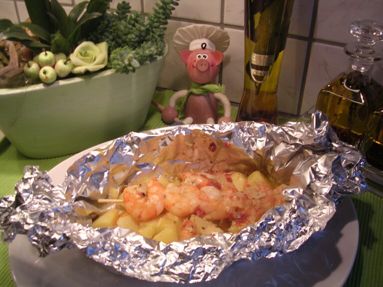 Papillote van scampi’s op een spiesje