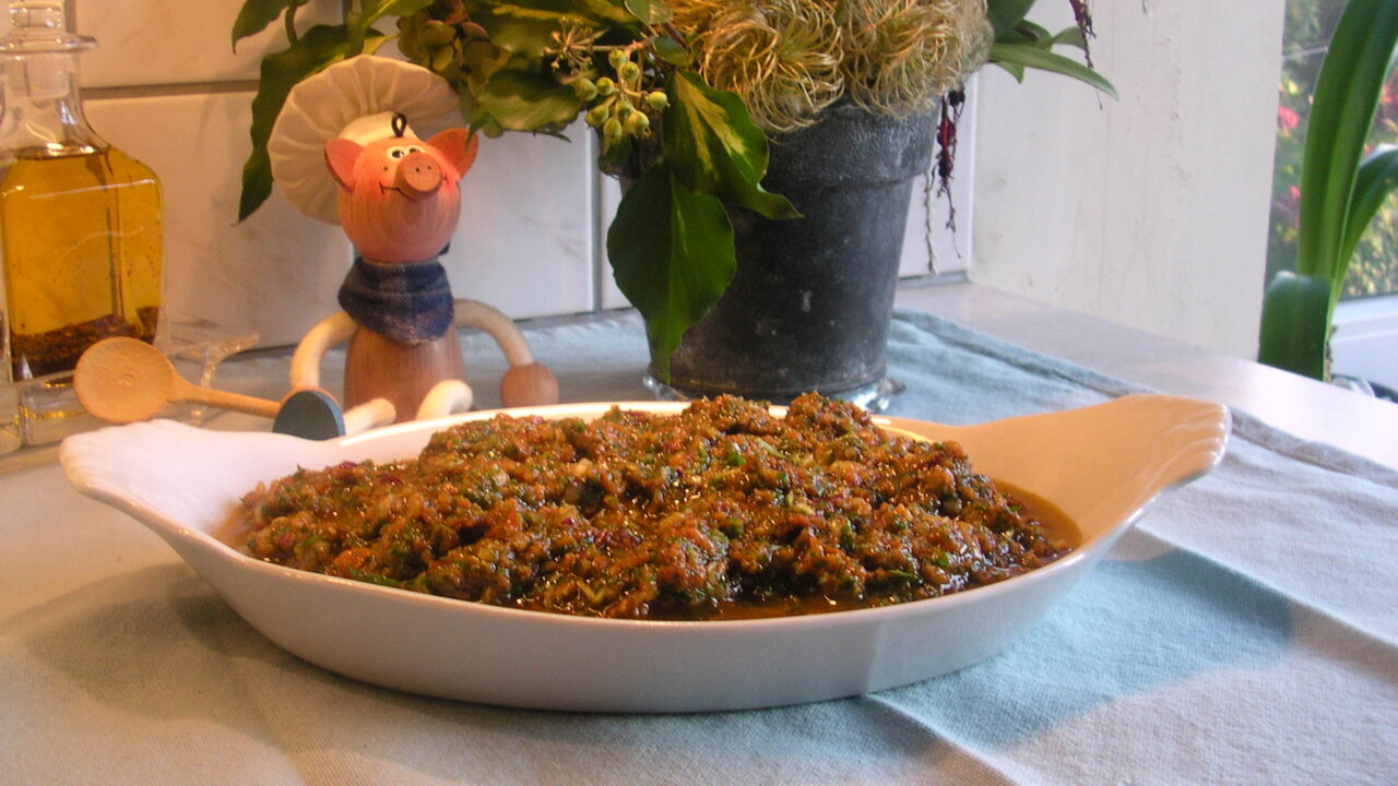 Saus : tapenade van rucola en zongedroogde tomaten