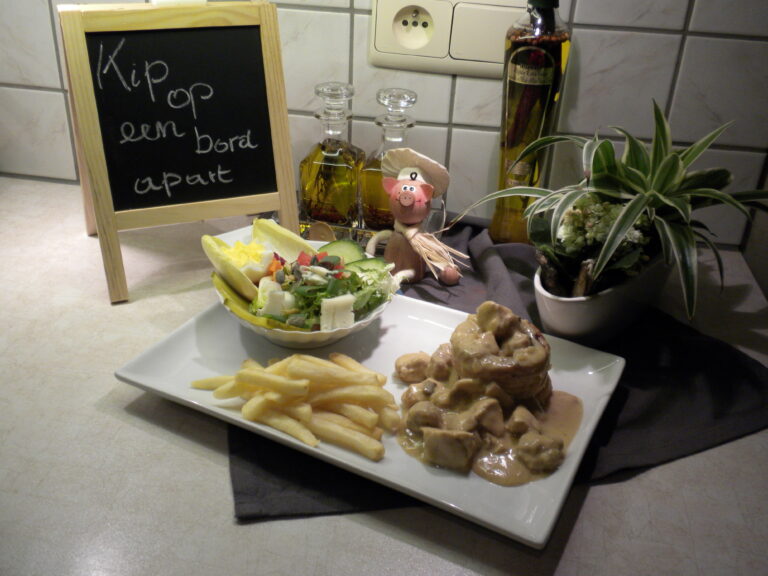 Kip op een bord apart : videe