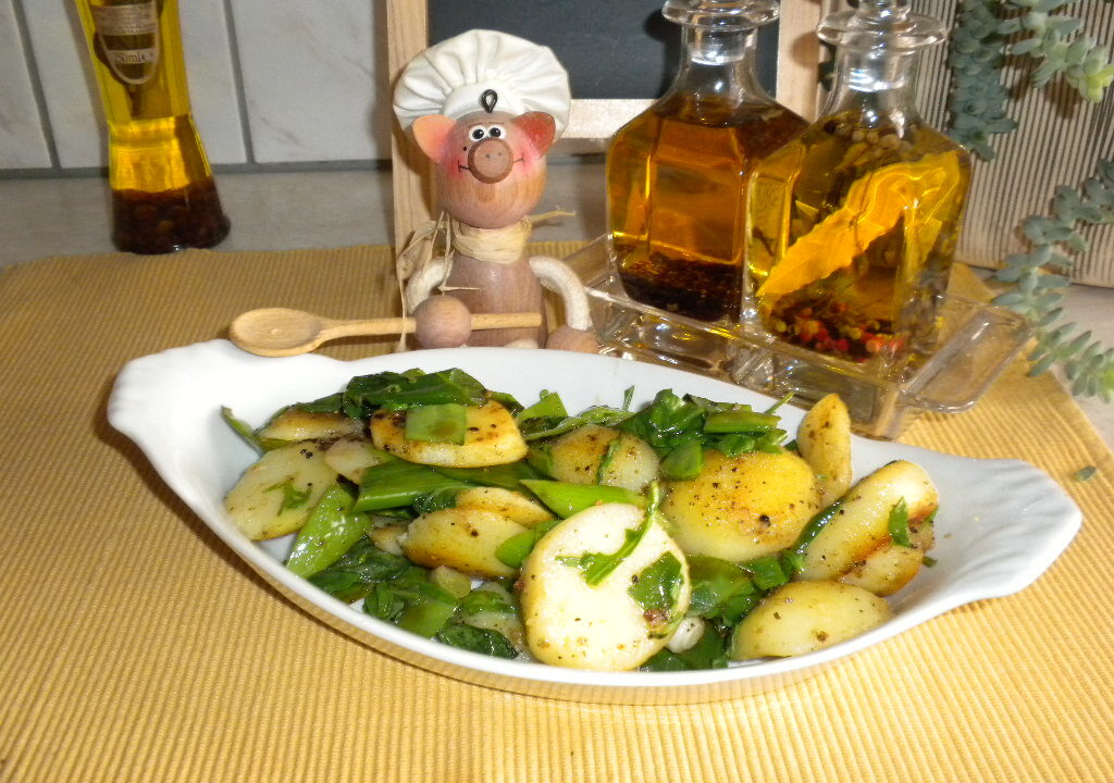 Aardappelen opgebakken in het groen