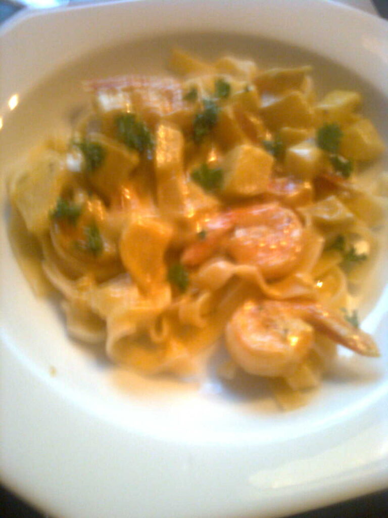 Scampi’s met curryroomsaus