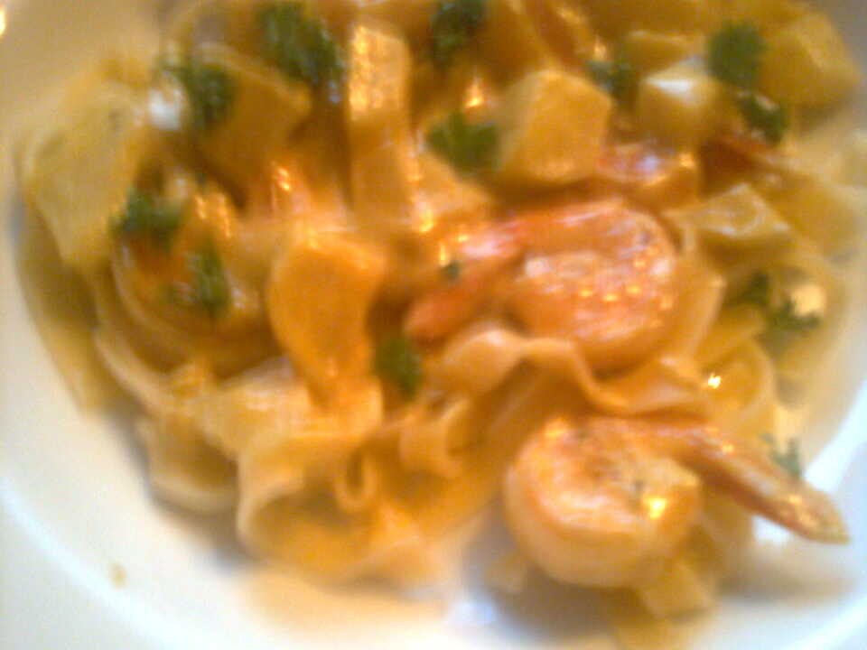 Scampi’s met curryroomsaus
