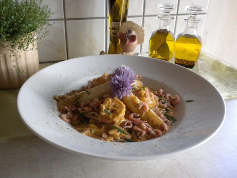 Pasta met asperges vergezeld van …