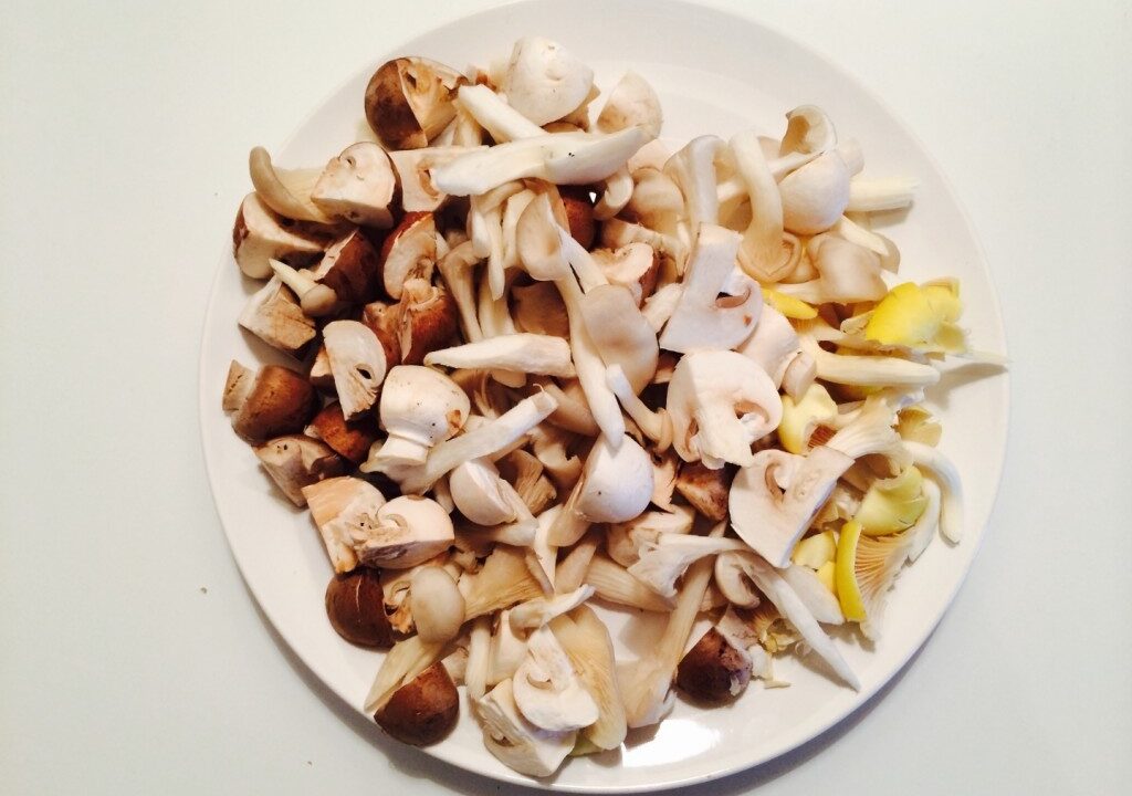 Penne met spinazie en paddenstoelen