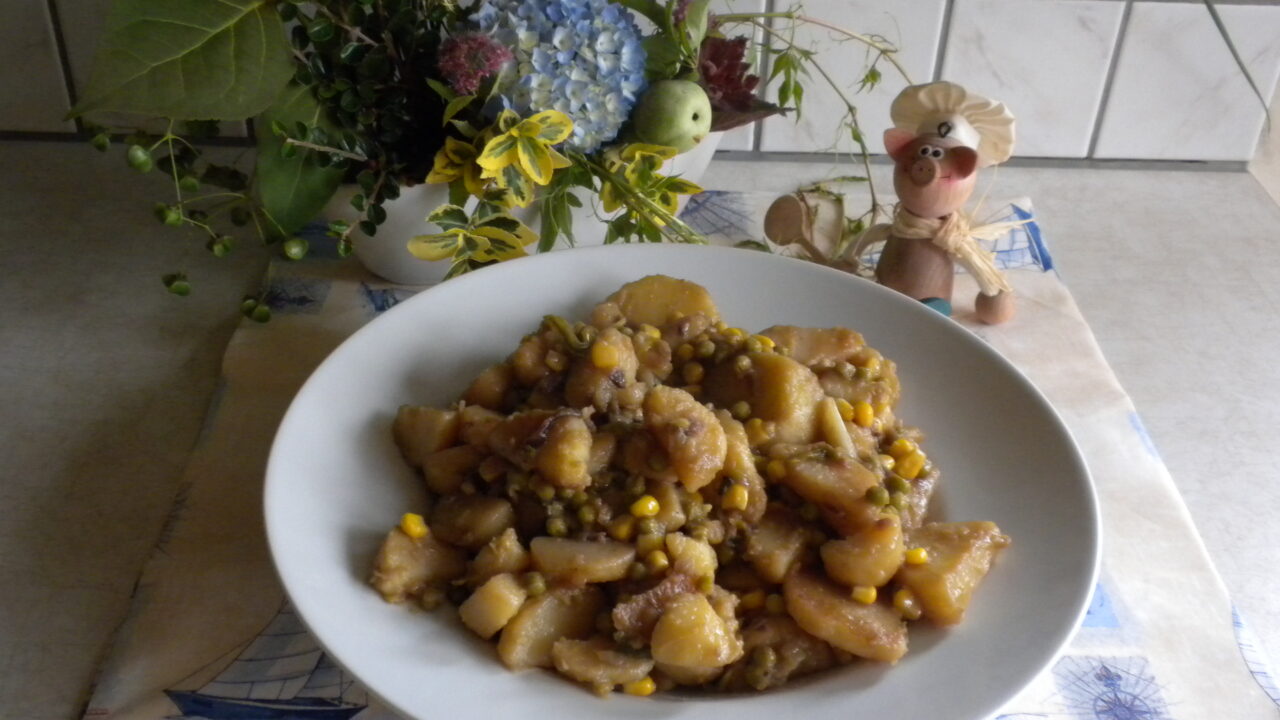 Aardappelschijfjes gestoofd met groenten