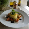 Scampi’s met puree op een bedje van wok groenten