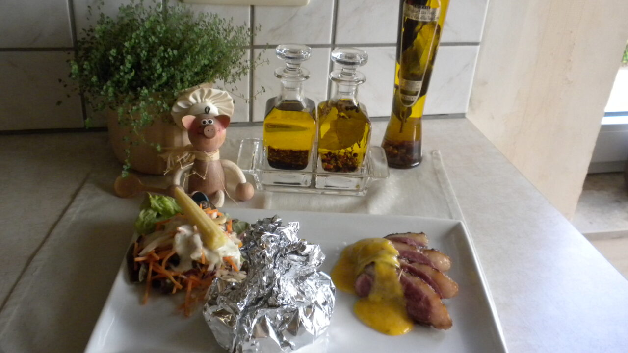 Eendenborst met mango en appelsien sausje