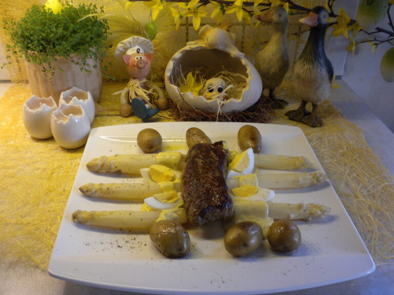 Steak vergezeld van asperges badend in bearnaise